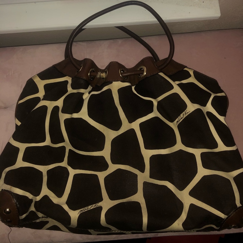 Michael Kora giraffe print bag